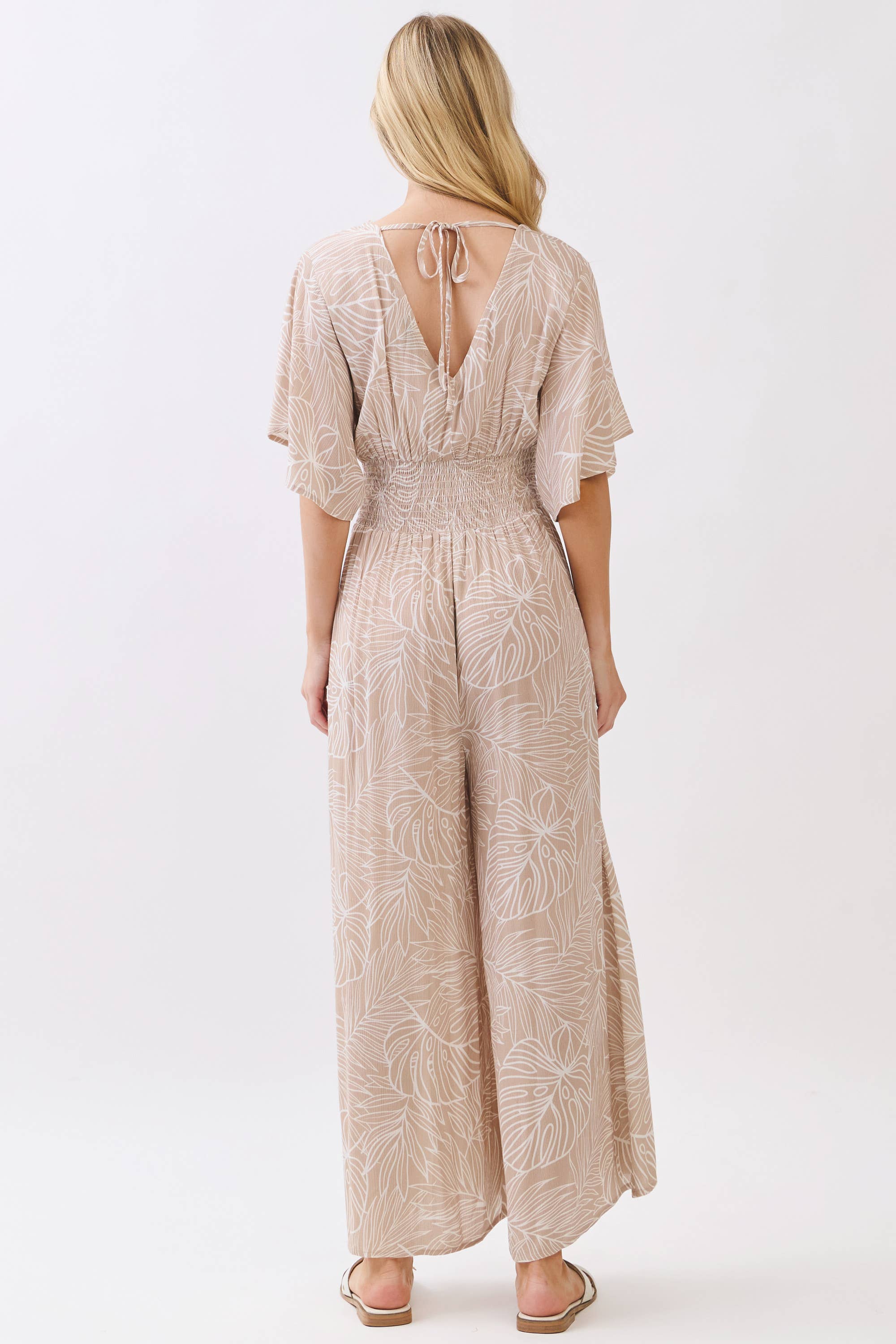 LEAF PRINT SURPLICE WIDE LEG JUMPSUIT