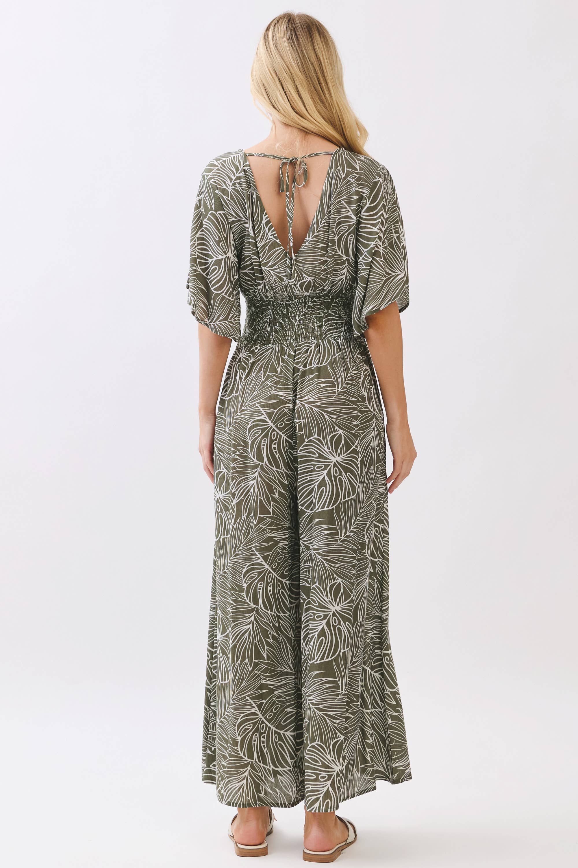 LEAF PRINT SURPLICE WIDE LEG JUMPSUIT